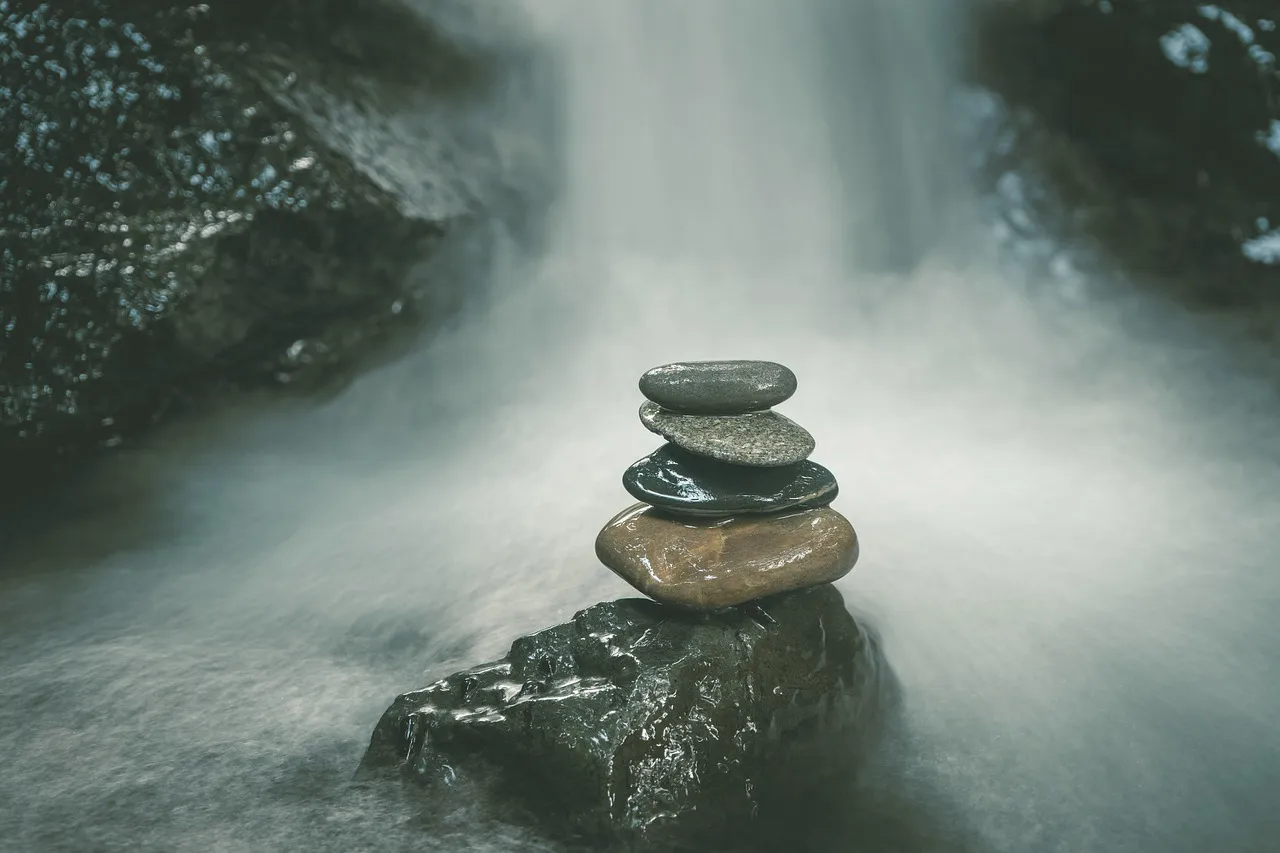 River stones held in drifting mist